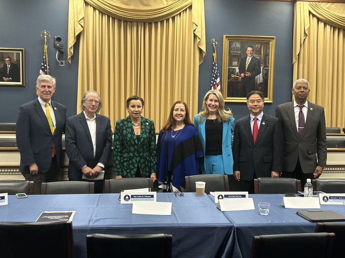 Panelists pose during the panel on the impact of generative artificial intelligence on small content creators.